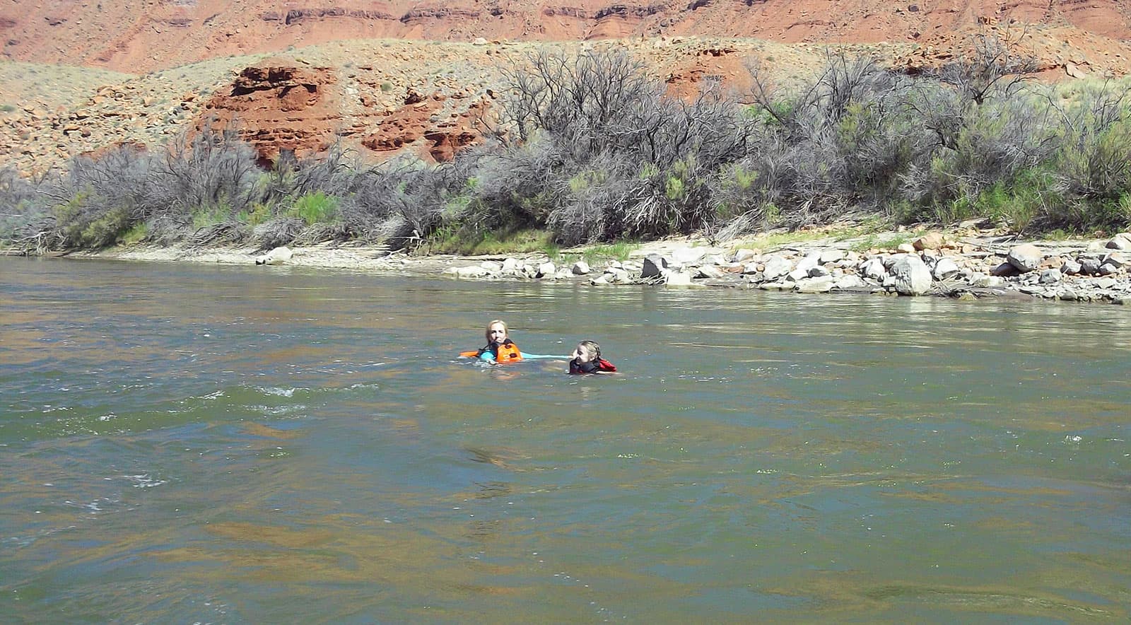 Teyla floating in the Colorado River